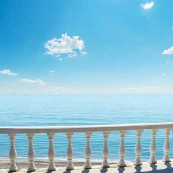 white balcony over sea and blue sky