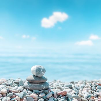 zen-like stones on beach. soft focus