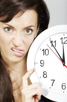 Woman with clock face looking concerned.