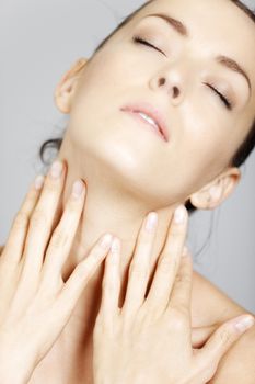 Young woman in a beauty style pose with natural skin.