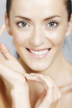 Young woman in a beauty style pose with natural skin.