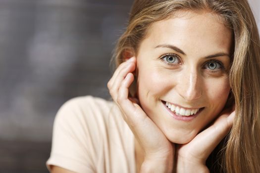 Beautiful young woman relaxing at home