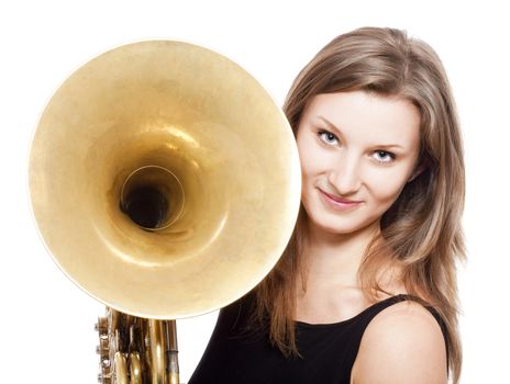 young female musician with concert french horn in black dress