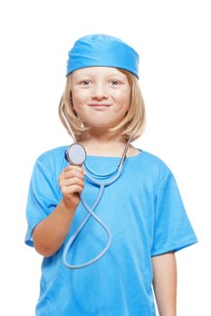 portrait of a boy with stethoscope playing a doctor