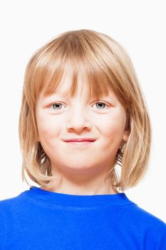 portrait of a boy with long blond hair in blue top - isolated on white