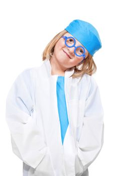 boy with long blond hair playing a doctor smiling