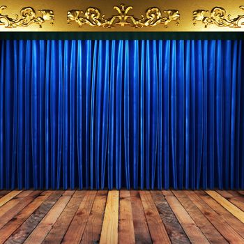 blue fabric curtain with gold on stage