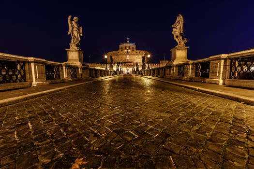 Castle of Holy Angel and Holy Angel Bridge over the Tiber River in Rome at Dawn, Italy