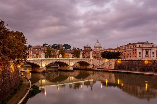 Illuminated Tiber River Embankment and Saint Peter's Cathedral in the Morning, Rome, Italy