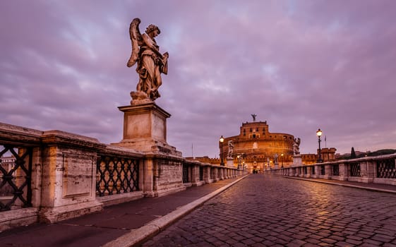 Castle of Holy Angel and Holy Angel Bridge over the Tiber River in Rome at Dawn, Italy