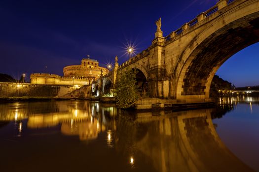 Castle of Holy Angel and Holy Angel Bridge over the Tiber River in Rome at Dawn, Italy