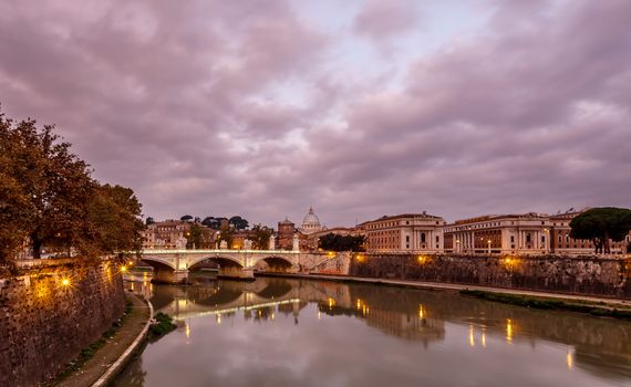 Illuminated Tiber River Embankment and Saint Peter's Cathedral in the Morning, Rome, Italy