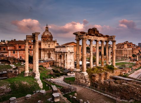 Roman Forum (Foro Romano) and Ruins of Septimius Severus Arch and Saturn Temple at Sunset, Rome, Italy