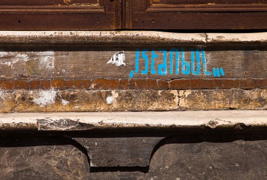 The word Instanbul painted on a doorstep in that city
