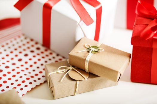 Red, white and earthy colored gift boxes