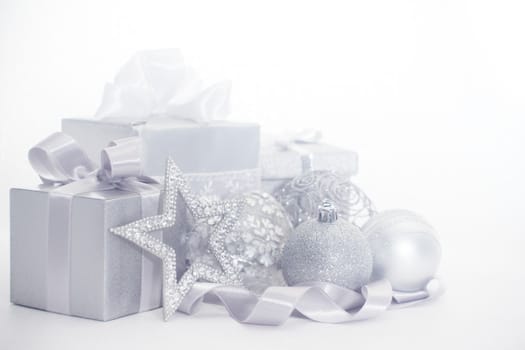 Silver christmas card with gifts and decoration