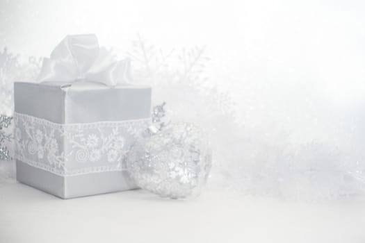 Silver christmas card with gifts and decoration