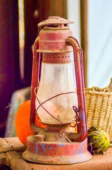 rustic old oil lantern on a farm