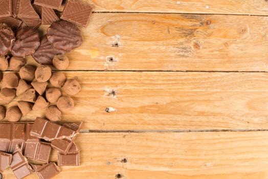 Assorted candy displayed on a rustic wooden table