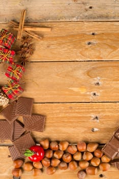 Christmas treats and food ingredients displayed on a rustic wooden table