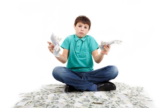 boy sitting on money, money concept, how to be successful, isolated on white background