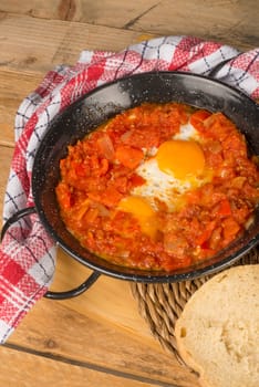Traditional sakshuka, poached eggs in a vegetable sauce