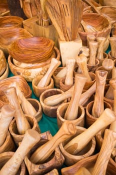 An assortment of handcrafted wooden kitchen utensils