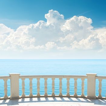 cloudy sky over sea and balcony