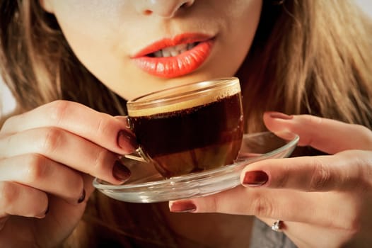 Beautiful Girl Drinking Coffee. Cup of Hot Beverage