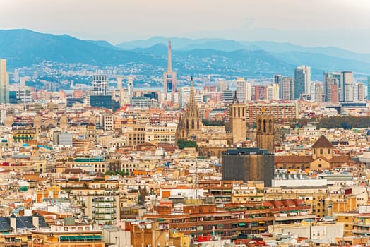 Barcelona, Spain - November 23: Aerial view at Barcelona on November 23, 2013.  Ghotic Cathedral and modern buildings at the background.