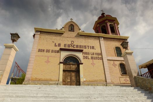 As a symbol of the Christian faith in the city of Saltillo, the church of Santo Cristo del Ojo de Agua is located on the top of the hill where the spring emerges which shows the name of the city.
This architectural gem houses a crucified Christ known as the Santo Cristo del Ojo de Agua many parishioners attributed to the presence of the spring, which seems to spring from its base.
The temple began to be built around 1917 and the Santo Cristo del Ojo de Agua came to town in 1927 for management of the third bishop of Saltillo, Jesus Maria Echavarria and Aguirre. 
Since 1840 the second Sunday in September we celebrate the "Feast of the Ojo de Agua". Devout people come to adore the Christ and tourists visit the place to admire its architecture and historical value that retains many aspects of colonial settlements. 
Religious celebration becomes a warm popular festival where locals and have fun on the rides, celebrated with the famous dance of the dancers and participate in songs, dances and celebrations surrounding this unique celebration.
