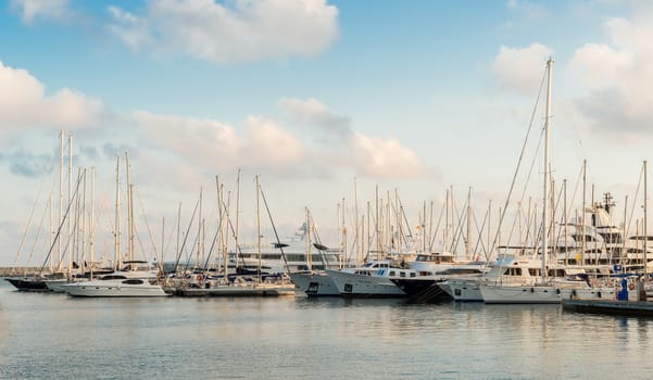 Vilanova i la Geltru, Spain - September 26: Sunset and view at sail boats in Vilanova i la Geltru marina on September 26, 2013.