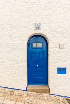 View at old house when walking the street in Sitges, Spain.