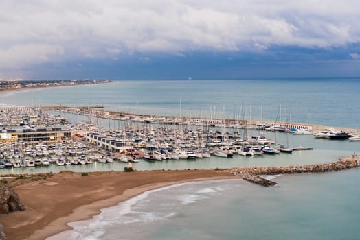 Casteldeffels, Spain - October 11, 2013: Sail Boats parking in Port Ginesta in Castelldeffels near Barcelona Spain