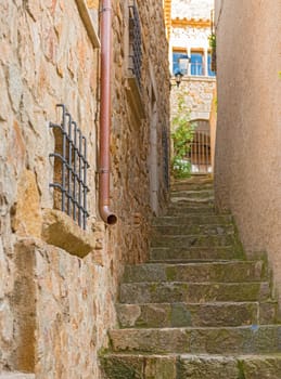 Stairs in medievaltown of Tossa del Mar on Costa Brava, Spain