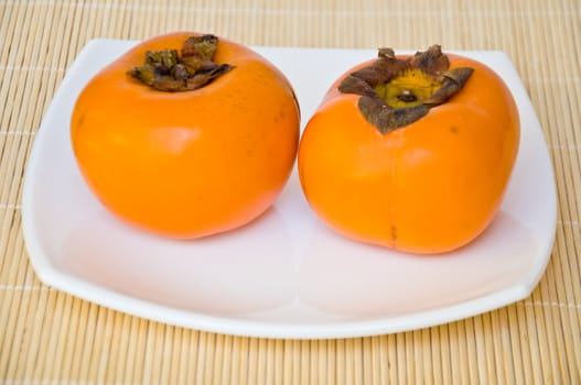 persimmon fruit on white background