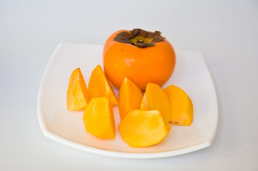 persimmon fruit on white background