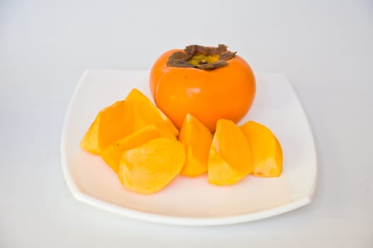 persimmon fruit on white background