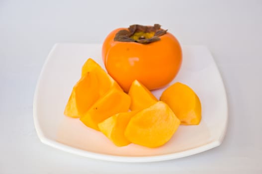 persimmon fruit on white background