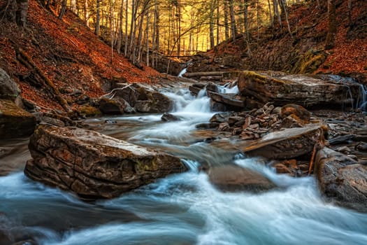 Fresh water in a mountain stream among stones
