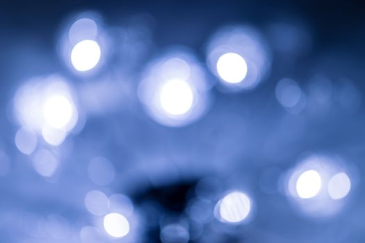 Natural smooth bokeh on blue background