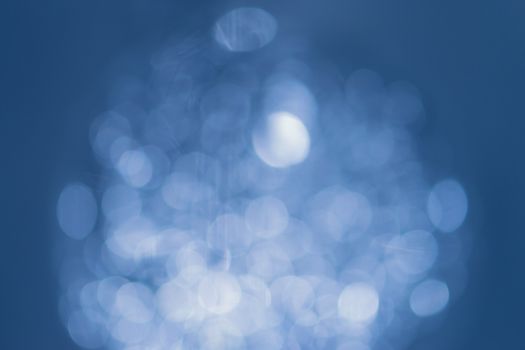 Natural smooth bokeh on blue background