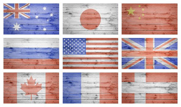 World flags collage over natural wood planks texture