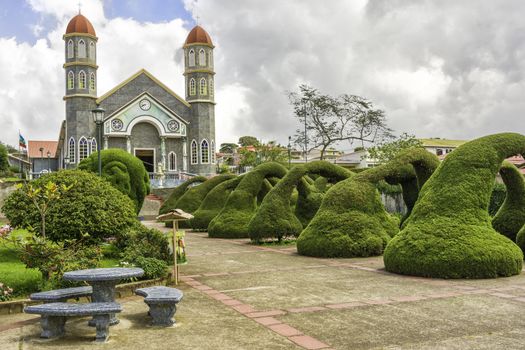 Park in front of the Catholic Church in Zarcero Costa Rica.