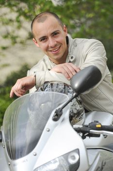 Young man with motorcycle