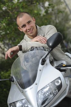 Young man with motorcycle