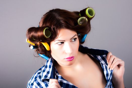 portrait of housewife with curlers
