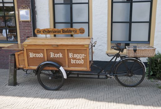 old backery bike from holland with the dutch word for cake and bread on it