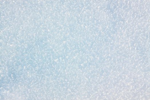 White snow crystals background texture. 