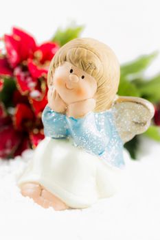 Holy baby Angel with poinsettia - Christmas symbol